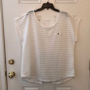 White tee with button up back
